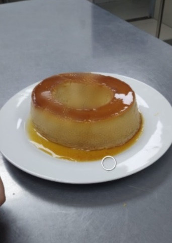 Una foto de Postre crema volteada
