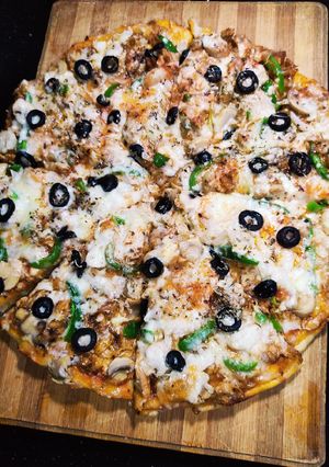 A picture of Chicken Tikka With Mushroom Pizza 🍕.