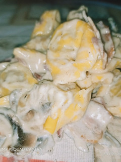 Una foto de Raviolis a la carbonara