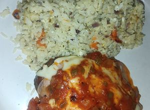 Una foto de Arroz saborizado con bondiola a la pizza