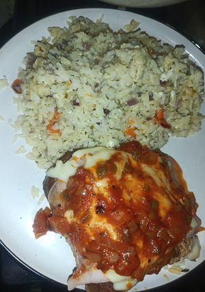 Una foto de Arroz saborizado con bondiola a la pizza