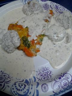 A picture of Creamy flats over a vegetable egg cake.