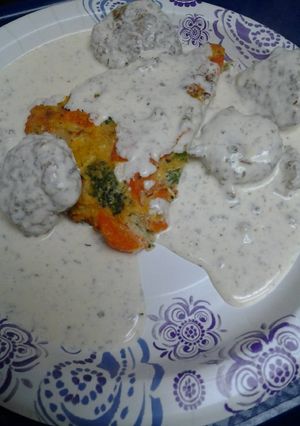 A picture of Creamy flats over a vegetable egg cake.