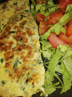 Una foto de Omellet de perejil relleno de queso