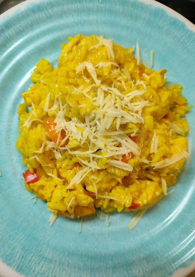Una foto de Arroz con pollo al curry
