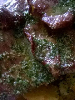 Una foto de Secreto ibérico al horno con ajo y perejil