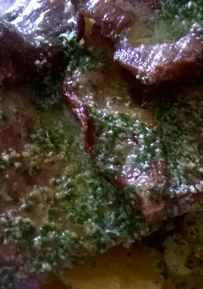 Una foto de Secreto ibérico al horno con ajo y perejil