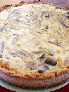 Una foto de Quiche de cebolla, choclo y champiñones
