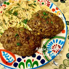 Beef cutlets with boletus mushrooms and cheese A picture of Beef cutlets with boletus mushrooms and cheese.