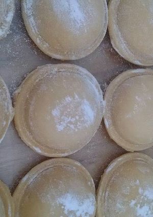 Una foto de Sorrentinos de jamón y queso
