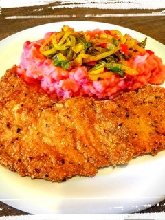 Una foto de Milanesa de Cerdo con Puré Mixto