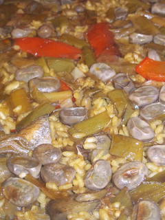 Una foto de Arroz seco de verduras con caldo de cocido