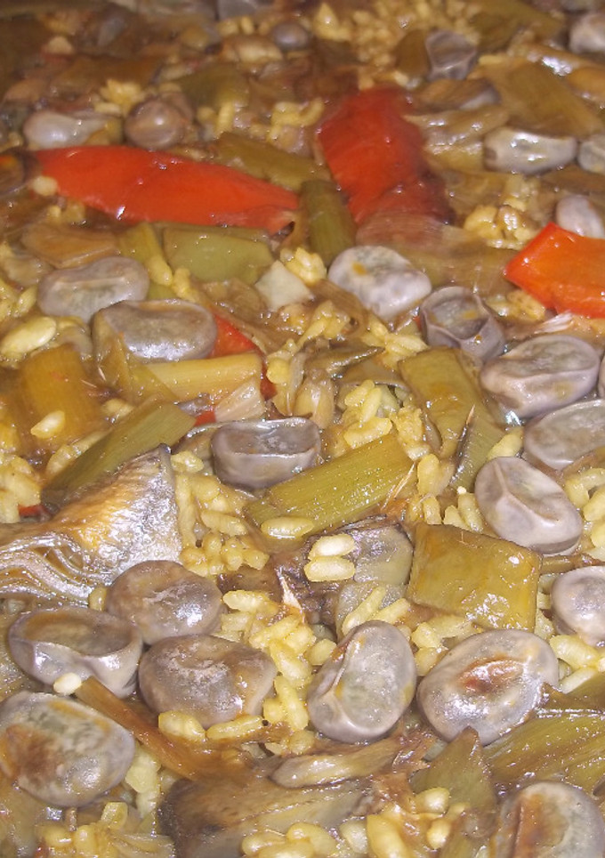 Una foto de Arroz seco de verduras con caldo de cocido