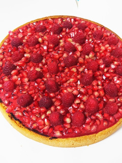 Una foto de Tarta de queso con frutos rojos