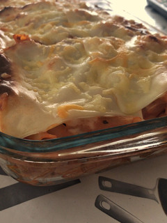 Una foto de Macarrones queseros al horno