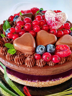 Foto di Torta fredda alle mousse di frutti di bosco e cioccolato