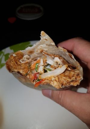 A picture of Sweet twisted pulled chicken wrap.