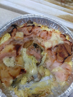Una foto de Pastel de queso con jamón y champiñones