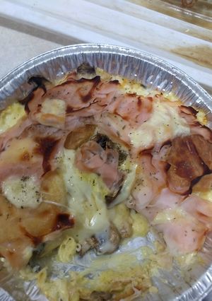 Una foto de Pastel de queso con jamón y champiñones