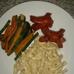 A picture of Cream cheese macaroni with veggies.