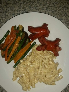 A picture of Cream cheese macaroni with veggies.