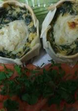 Una foto de 'Canastitas de espinacas y salsa blanca'