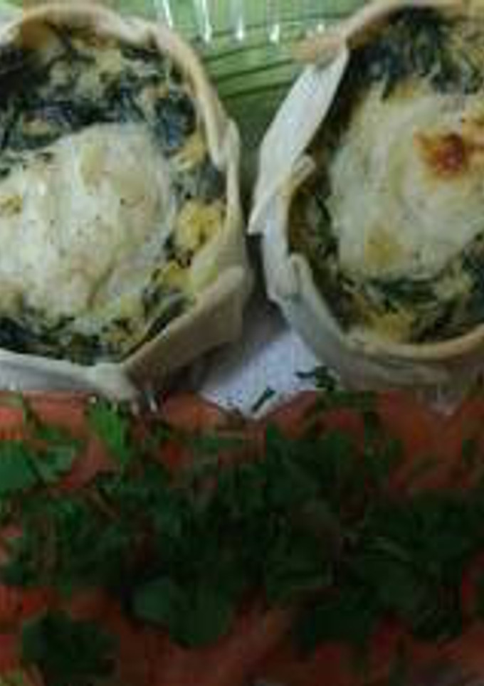 Una foto de 'Canastitas de espinacas y salsa blanca'
