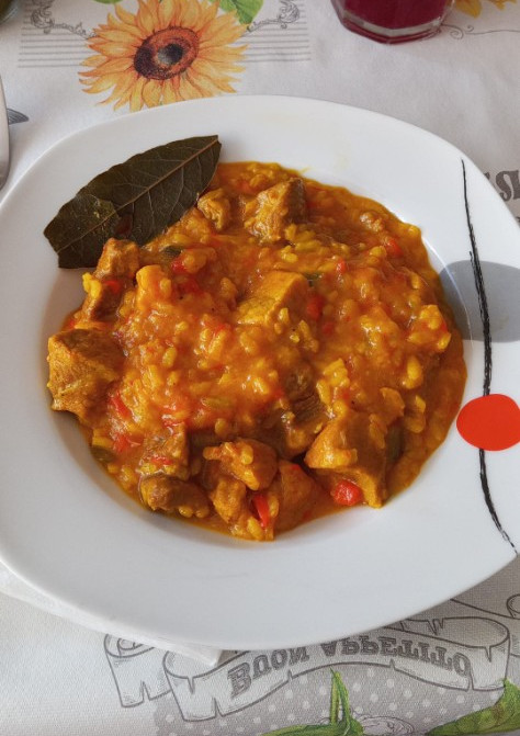 Una foto de Arroz meloso de magro