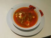 Una foto de ejotes con queso