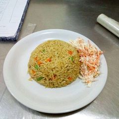 Jollof Rice with coslow A picture of Jollof Rice with coslow.