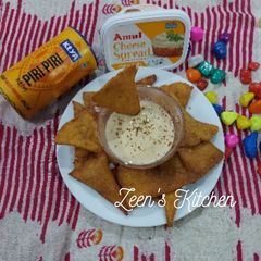 A picture of Whole Wheat and Maize Flour Nachos with Cheese Dip.