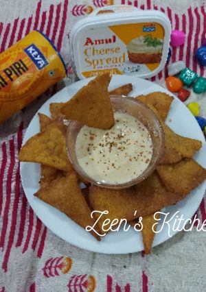 A picture of Whole Wheat and Maize Flour Nachos with Cheese Dip.