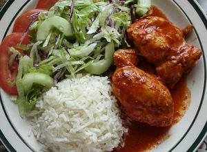 Una foto de Pollinita (pollo tipo pibil)