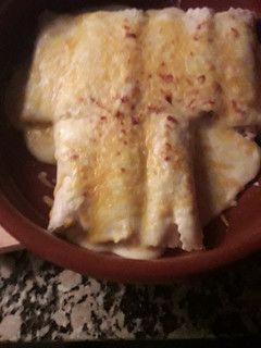 Una foto de Canelones de pollo asado