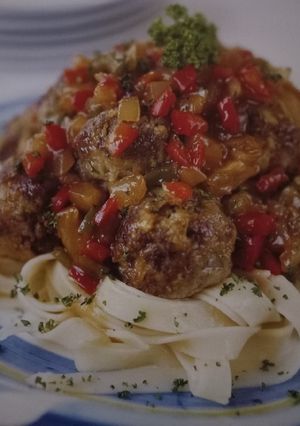 A picture of Meatballs in a sweet-and-Sour Sauce.