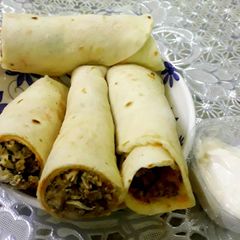A picture of Chicken shawarma rolls.