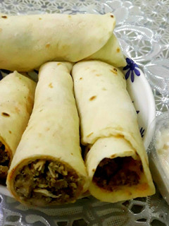 A picture of Chicken shawarma rolls.