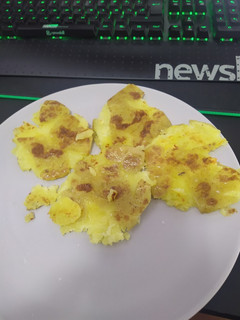 Una foto de Acompañamiento - Patatas chafadas