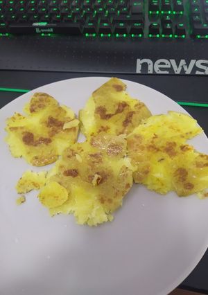 Una foto de Acompañamiento - Patatas chafadas