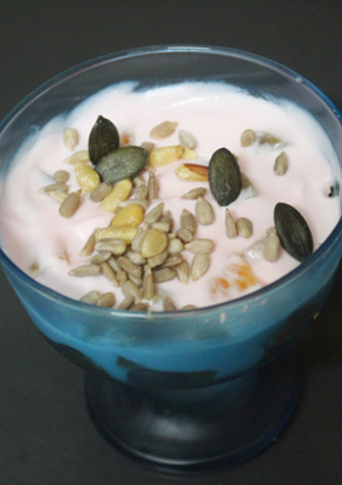 Una foto de Mandarinas con uvas y yogurt