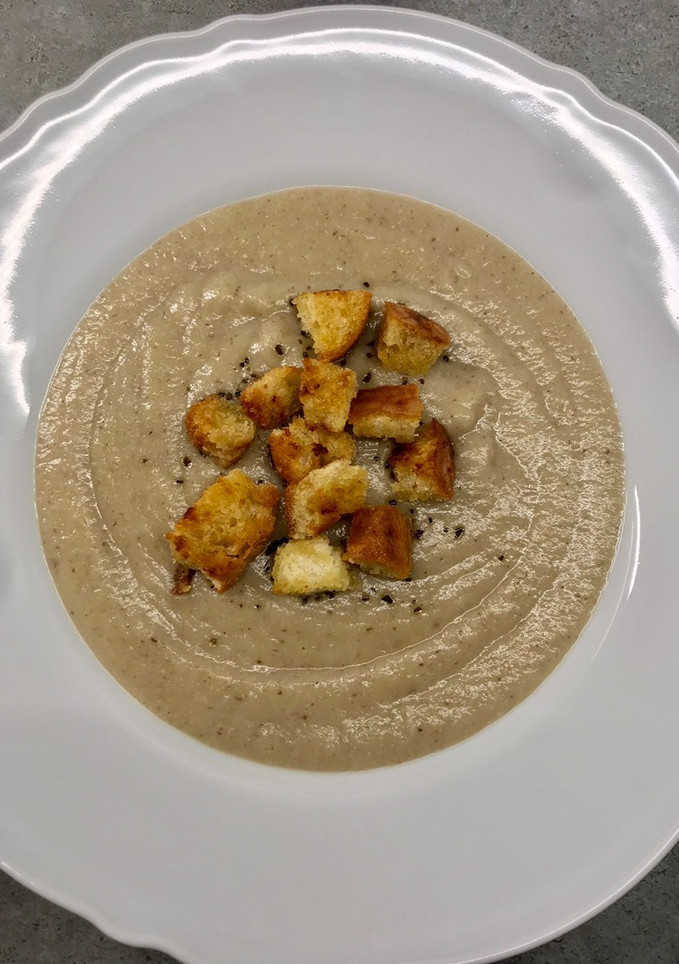 Una foto de Crema de coliflor y setas shiitake