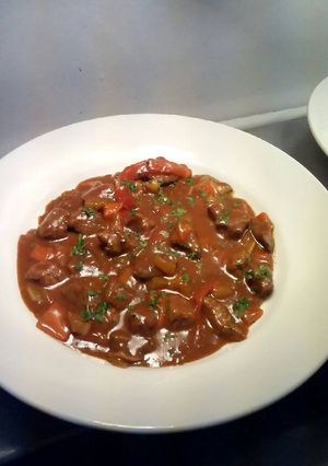 A picture of Beef in a red wine sauce.