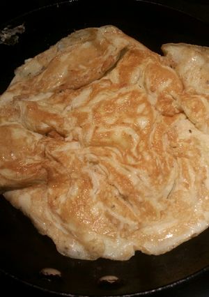 Una foto de Tortilla Italiana con orégano y albahaca