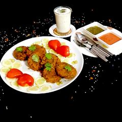 A picture of Stuffed Cutlet with Daliya+Kala Chana.