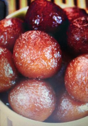 A picture of Delicious gulab jamun.