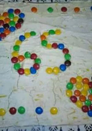 Una foto de Torta 65 años
