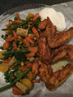 A picture of Baked Wings & Mix Vegetables.