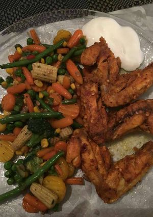 A picture of Baked Wings & Mix Vegetables.
