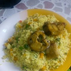 A picture of Fried Rice with Fresh stock fish kpanla.