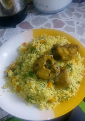 A picture of Fried Rice with Fresh stock fish kpanla.